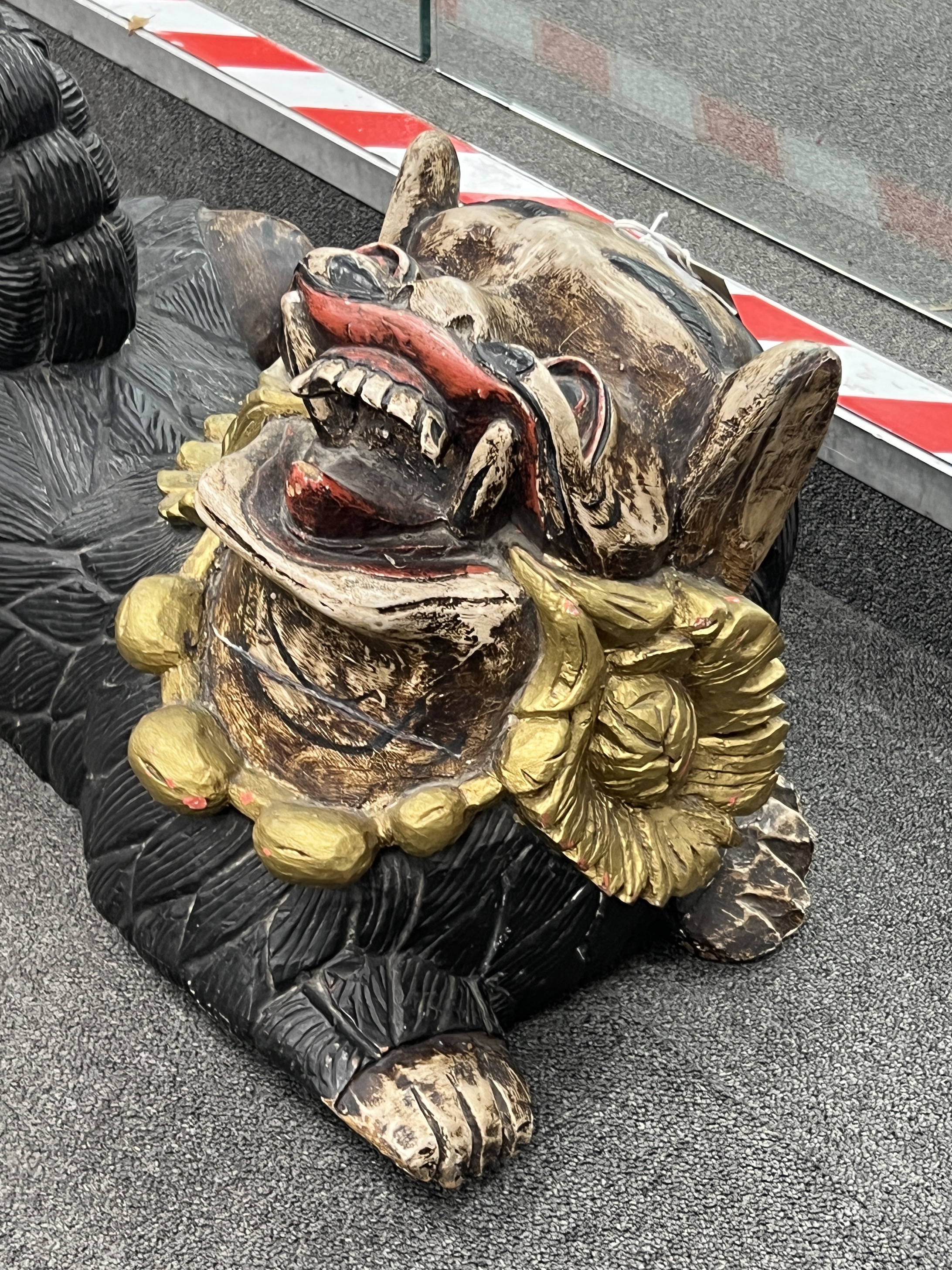 A Chinese painted temple dog, length 62cm